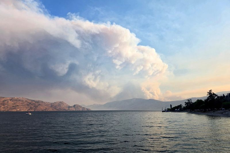 British Columbia declares state of emergency as more than 20,000 flee ...